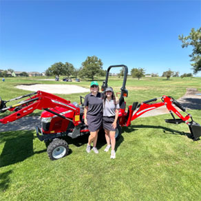 golf fore good people in front of tractor