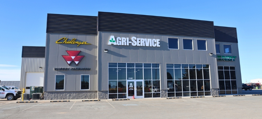 Agri-Service Blackfoot location banner showing dealership exterior and parking area.