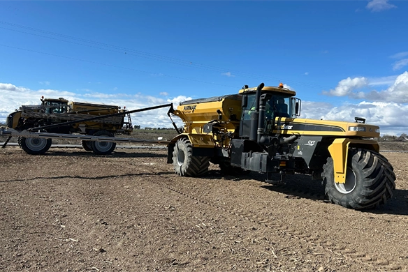 TerraGator application equipment operating in the field under clear skies during customer support operations in Marsing, Idaho