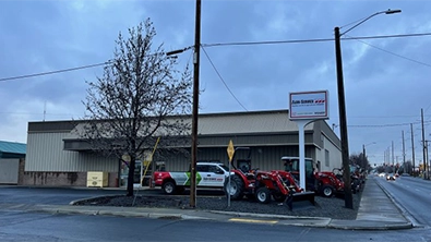 Agri-Service Walla Walla dealership exterior with lot and service entrance visible.